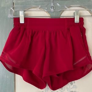 Like new red Lululemon hotty hot 2.5” low rise shorts size 2
